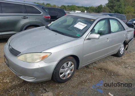 2004 Toyota Camry Le z USA, uszkodzony, nr VIN 4T1BE30K64U935692